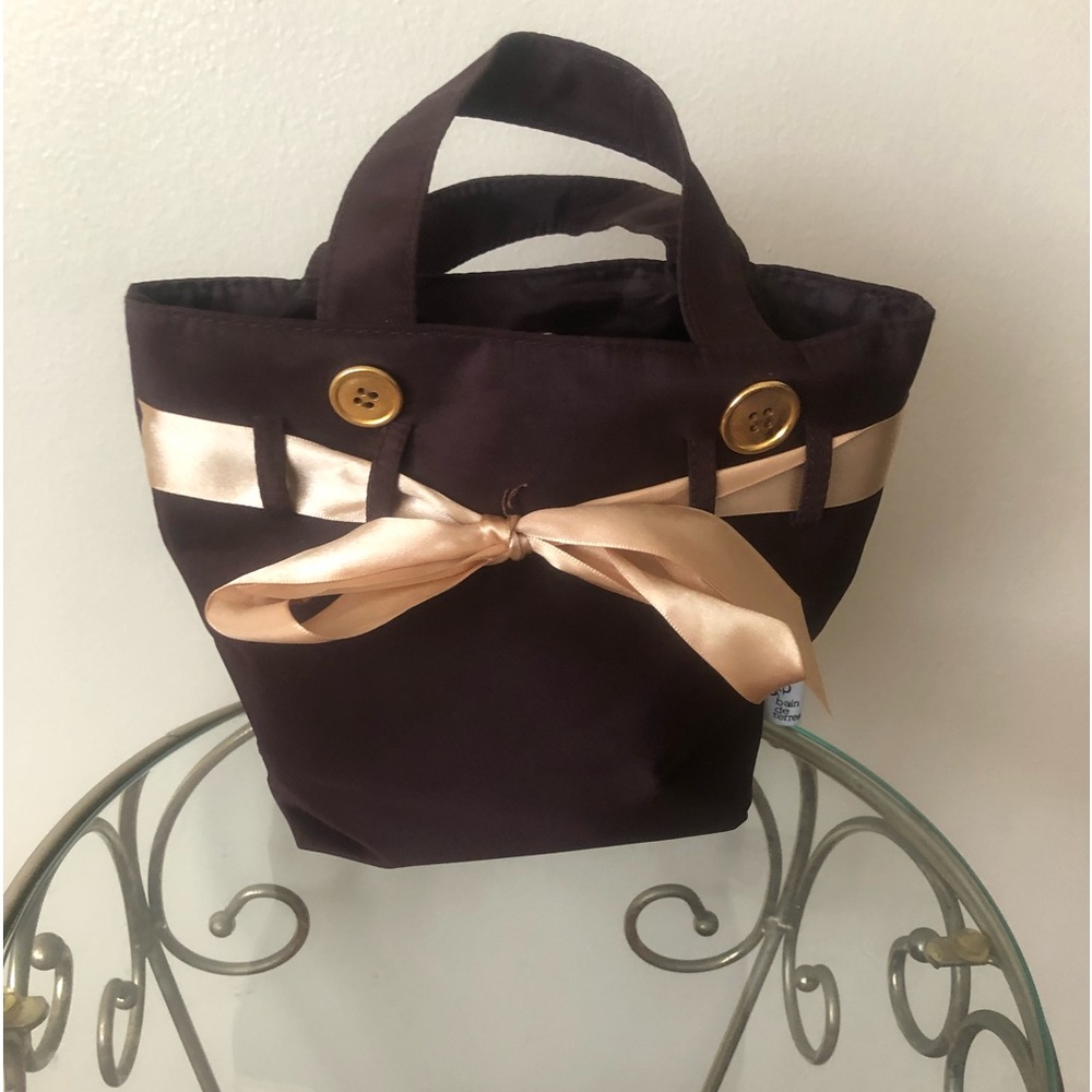 Bain de terre fabric mini handbag.